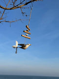Wind chime made of driftwood (White and grey gull)