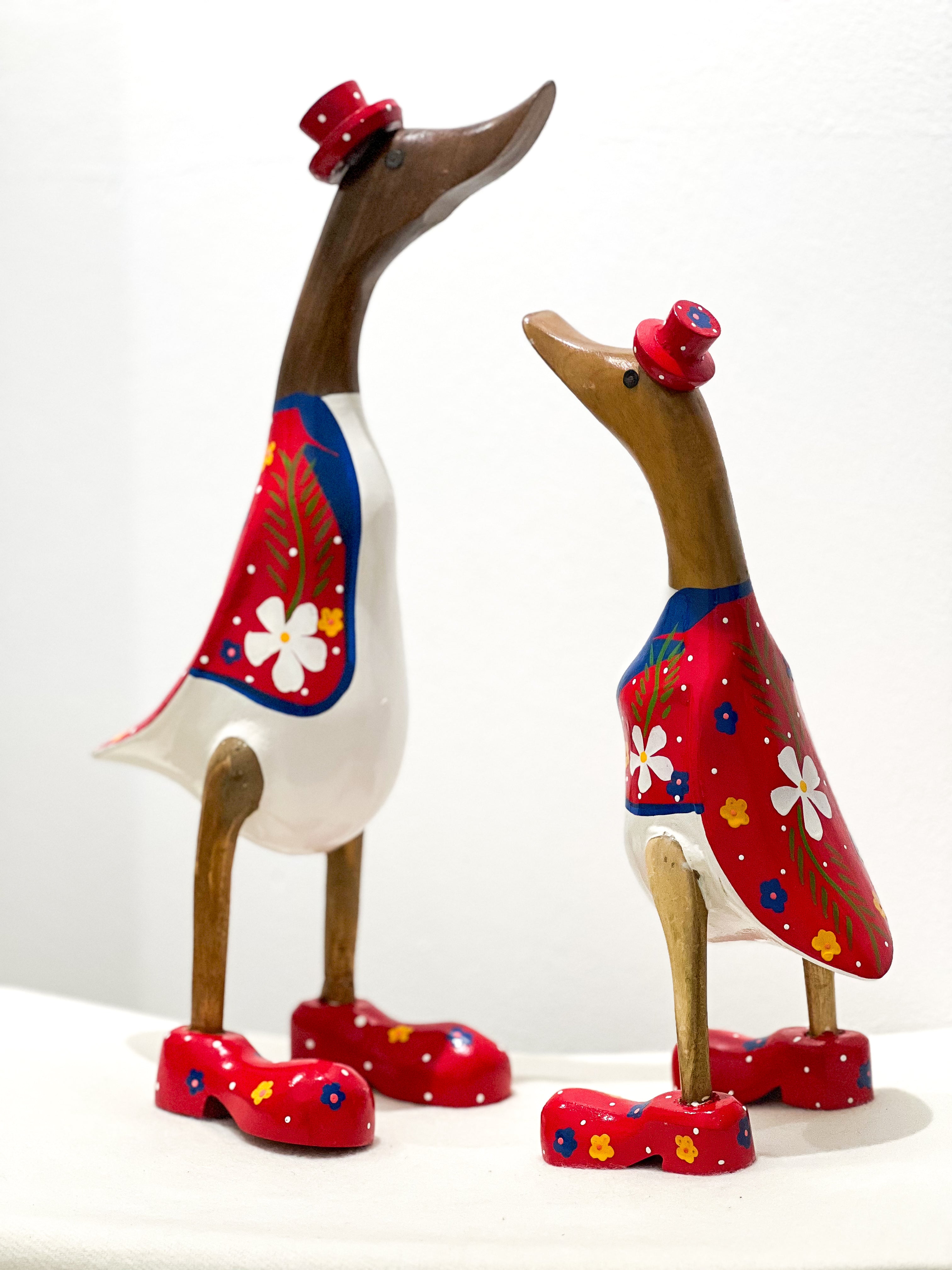 Duck Family in Red Costumes