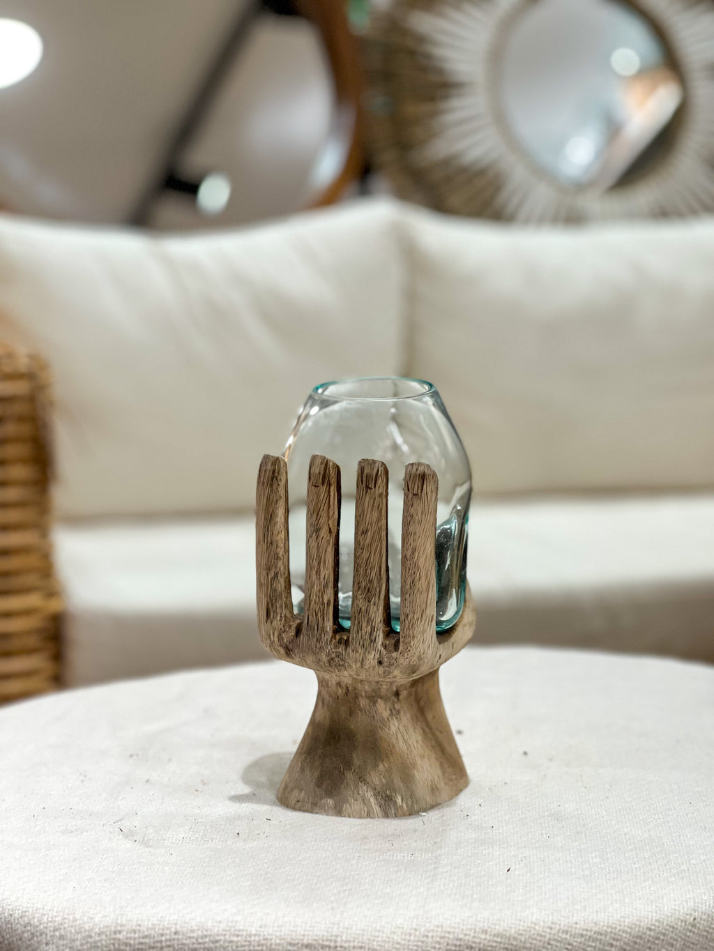 Glass hand with natural wood accent