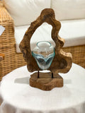 Glass vase with natural wood accent