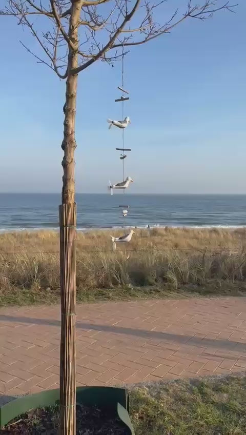 Wind chime made of driftwood (White and grey gull)